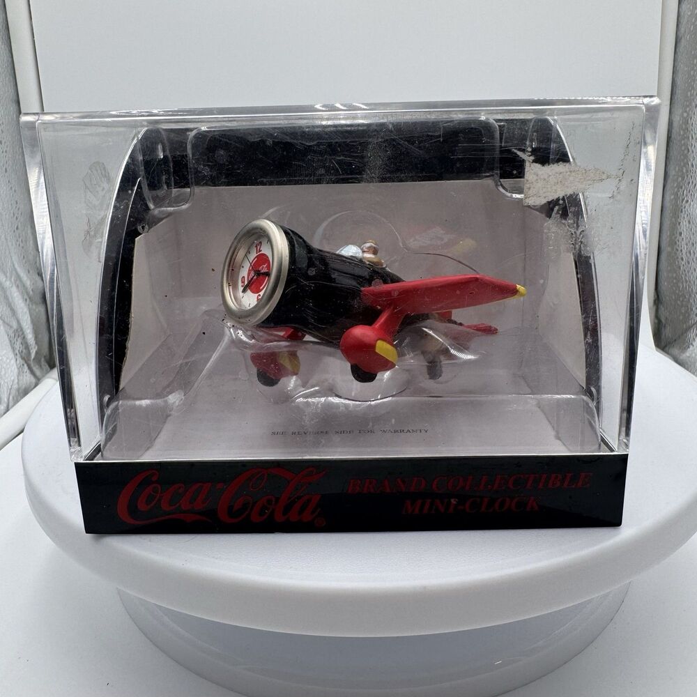 Coca-Cola Airplane Mini-Clock 1999 Black Red Silver Pilot Figure CCM05